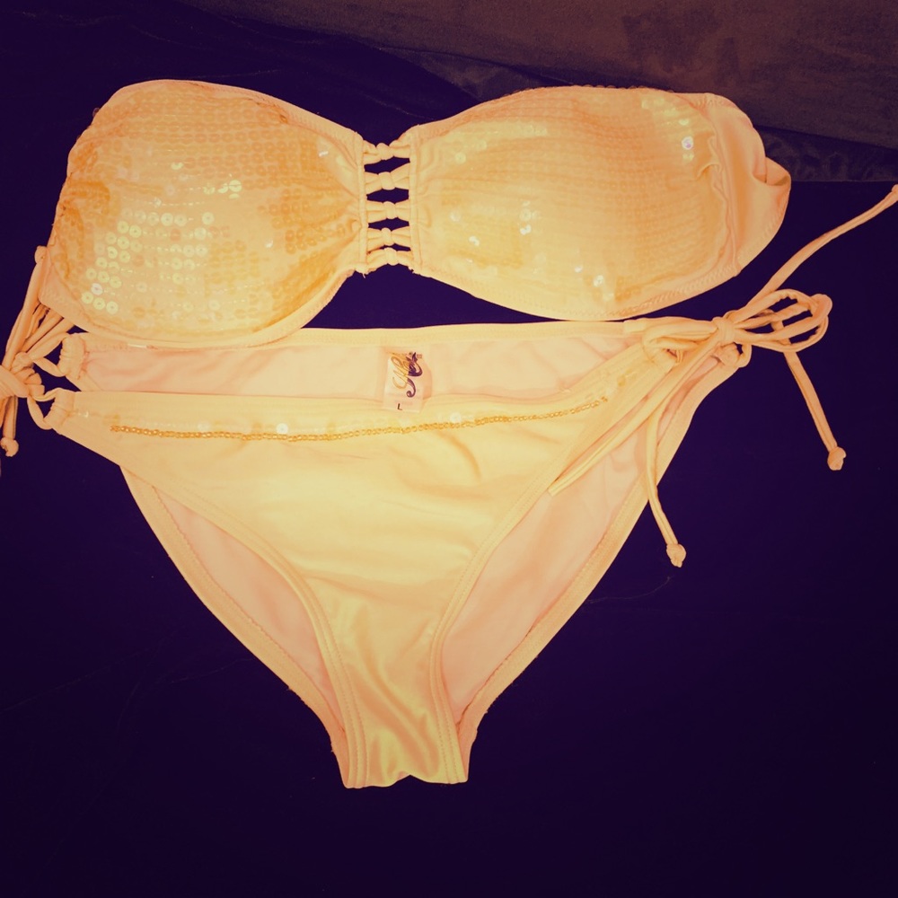 Never worn bikini with sequins detailing